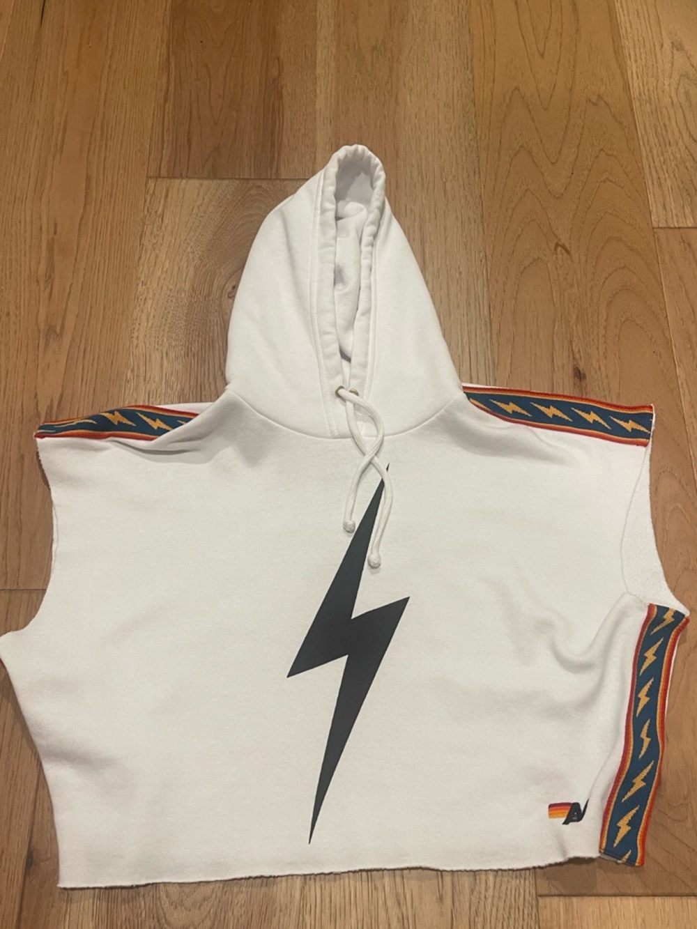 Aviator Nation White Sleeveless Hoodie with Black Lightning Bolt
